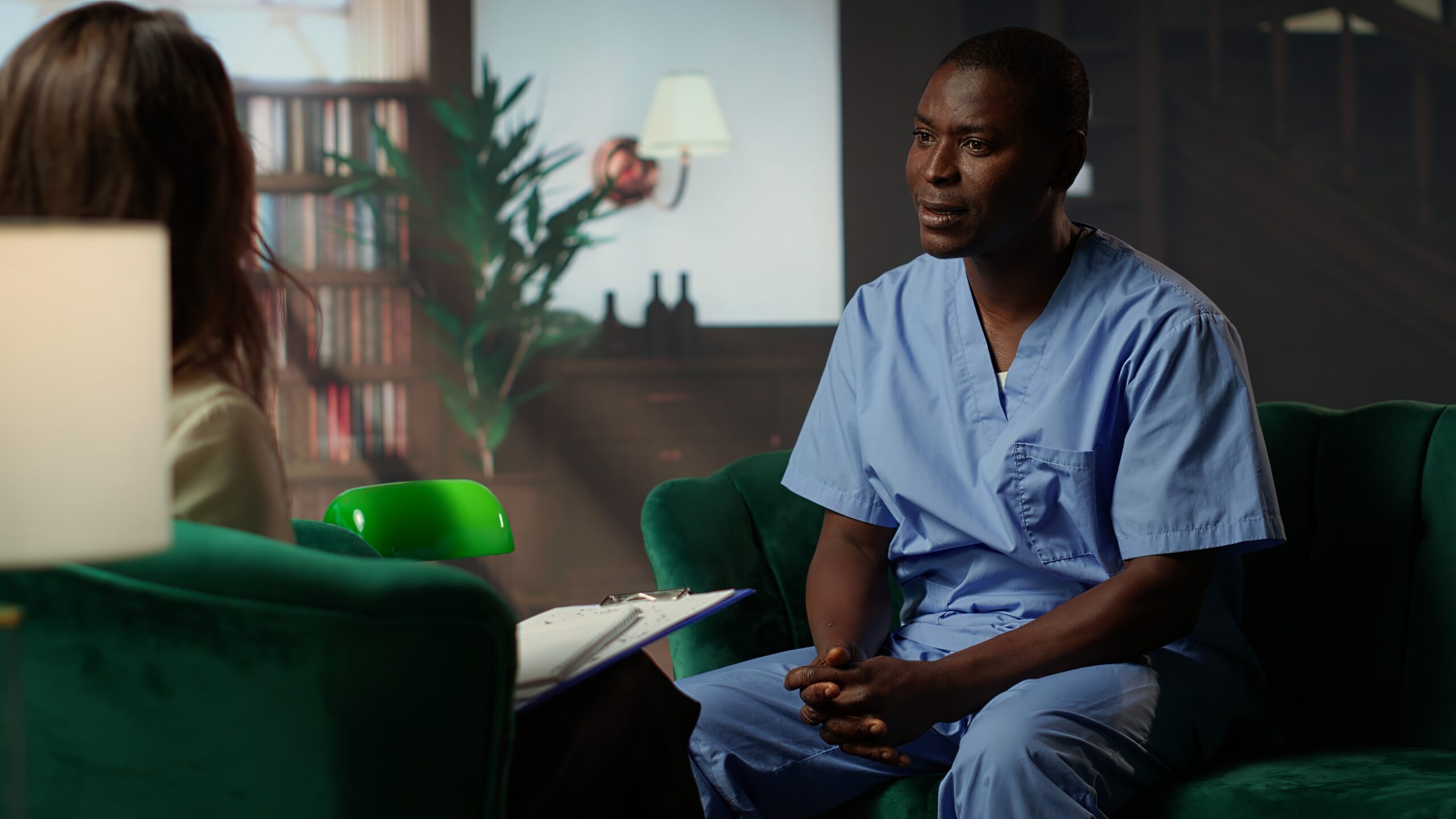 african american medical assistant scrubs reflects loss burnout 1 scaled